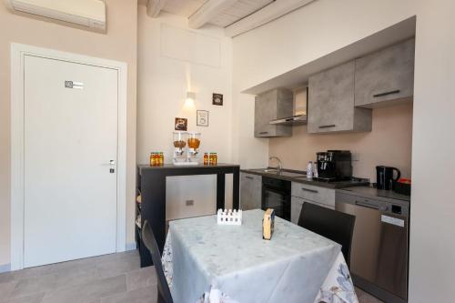 Kuchyň nebo kuchyňský kout v ubytování B&B Il Glicine