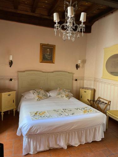 En eller flere senge i et værelse på Ai Savoia B&B - Guest House