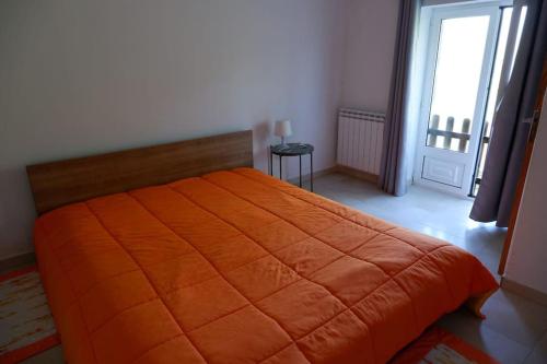 Postel nebo postele na pokoji v ubytování Casa da Loja Gerês