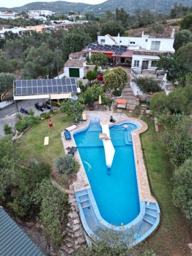 an overhead view of a swimming pool in a yard at Casa de Pedra e Cal in Vale da Rosa