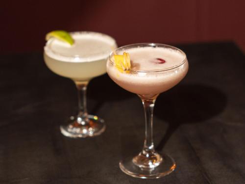 two cocktails in glasses sitting on a table at Seagoe Hotel in Portadown