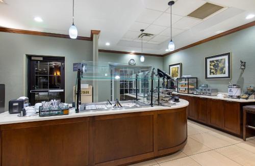 a lobby with a large counter in a pharmacy at Staybridge Suites-Knoxville Oak Ridge by IHG in Oak Ridge