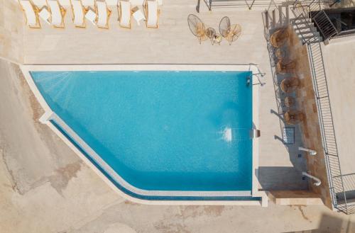 an overhead view of a swimming pool in a house at Rajska dolina Budva in Budva
