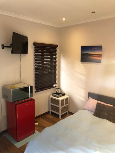 Ένα ή περισσότερα κρεβάτια σε δωμάτιο στο Aderem Blus Rooms