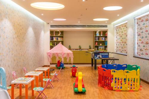 a play room with a bunch of toys in it at Fairfield by Marriott Goa Calangute in Calangute
