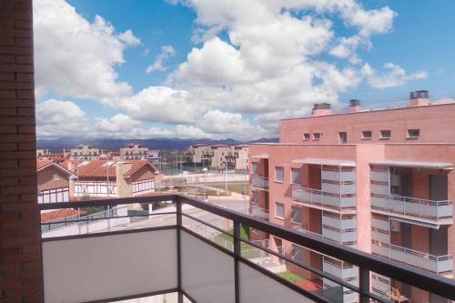 a view of a city from a balcony at 2 bedrooms apartement with shared pool and terrace at Ciruena in Cirueña