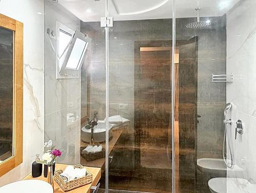 a bathroom with a shower and a sink at Comfortable Apartment with Pool in Agadir in Agadir