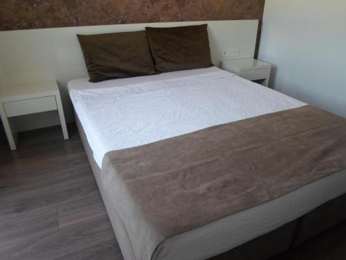 Postel nebo postele na pokoji v ubytování Myra Hotel