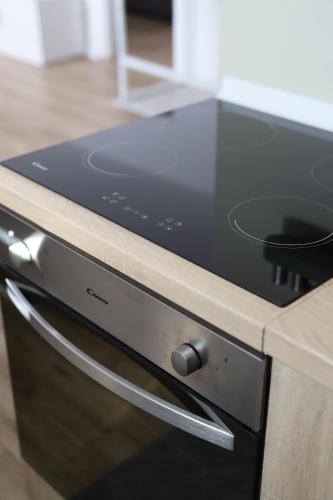 Η κουζίνα ή μικρή κουζίνα στο Apartman BUCO