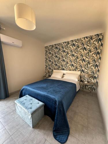 Postel nebo postele na pokoji v ubytování Sicily O'Clock Room