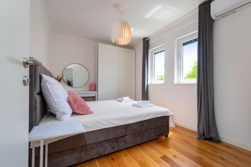 Ένα ή περισσότερα κρεβάτια σε δωμάτιο στο Rooftop Horizon