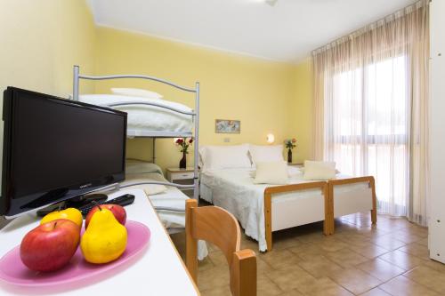 A bed or beds in a room at Hotel Meeting