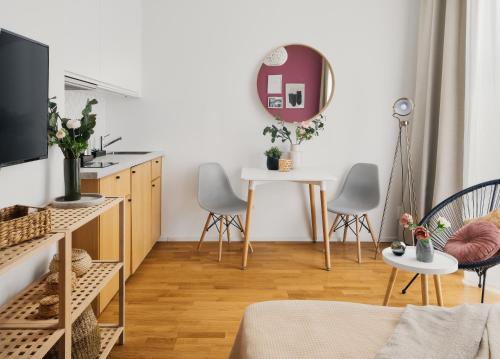 Televízia a/alebo spoločenská miestnosť v ubytovaní TurnKey I Downtown Studio