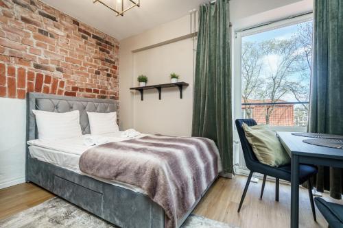 Postel nebo postele na pokoji v ubytování Dreamstay Avangard - shared Roof Terrace, High speed Wifi 200 Mbps & Gym