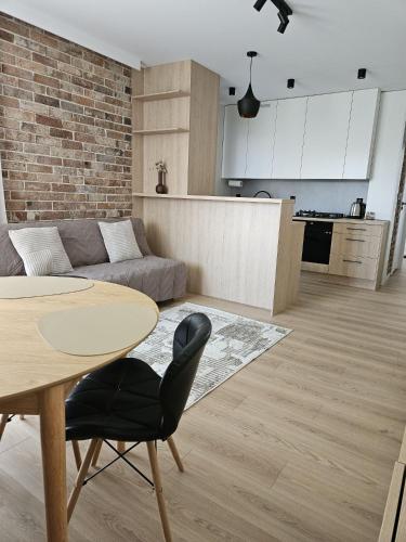 Kuchyň nebo kuchyňský kout v ubytování Urban Jungle Apartament SUNNY