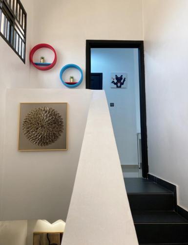 a staircase leading up to a door in a house at LUXURYs apartment in Abomey-Calavi