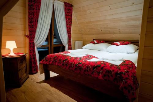 Posteľ alebo postele v izbe v ubytovaní Domek Deluxe Resort Willa Adrian