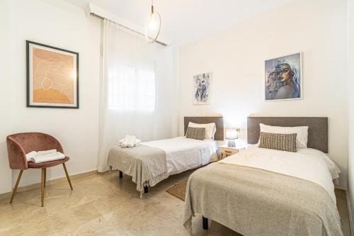 Postel nebo postele na pokoji v ubytování Luxury Golf Apartment - 3min to Puerto Banus