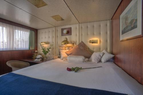 Ein Bett oder Betten in einem Zimmer der Unterkunft Sanssouci Star