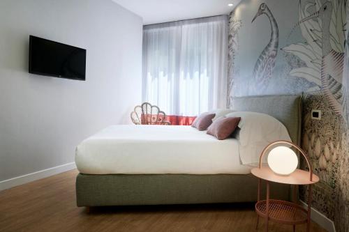 Ένα ή περισσότερα κρεβάτια σε δωμάτιο στο Residence Leopoldo