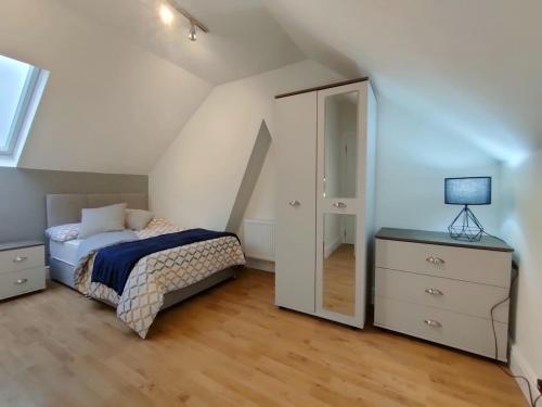 A bed or beds in a room at Howel property