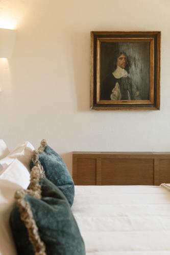 Ein Bett oder Betten in einem Zimmer der Unterkunft Hotel Castell de Vallgornera