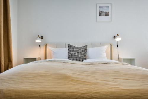 Кровать или кровати в номере Hotel Villa Klasen
