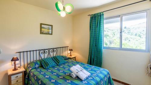 Postel nebo postele na pokoji v ubytování Casa Victoria Alozaina by Ruralidays