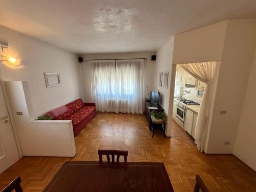 A bed or beds in a room at Casa Cornaro - Agenzia Cocal