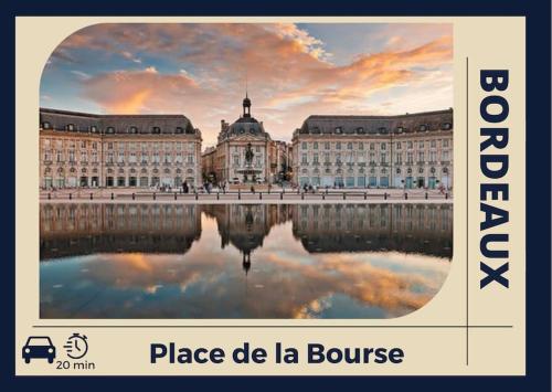 a picture of a building with its reflection in the water at Le Poète - Appartement Confort - Parking Privé - WIFI in Gradignan