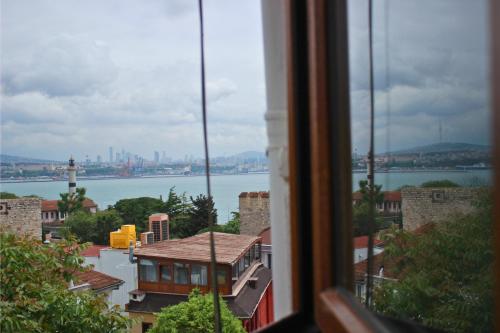 a view of the water from a window at Hotel Peninsula in Istanbul