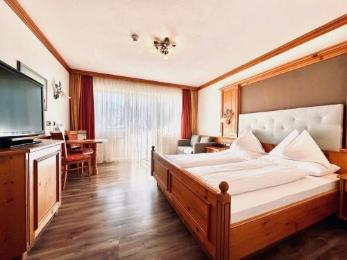 Postel nebo postele na pokoji v ubytování Hotel Das Urbisgut