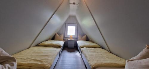Säng eller sängar i ett rum på Ferienhäuser Hohe Klinge