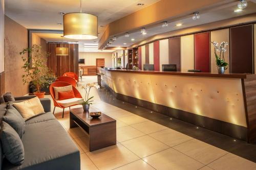 The lobby or reception area at Vitta Hotel Superior