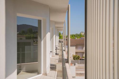 a view from the balcony of a house at APARTAMENTS LA CARPA in Banyoles