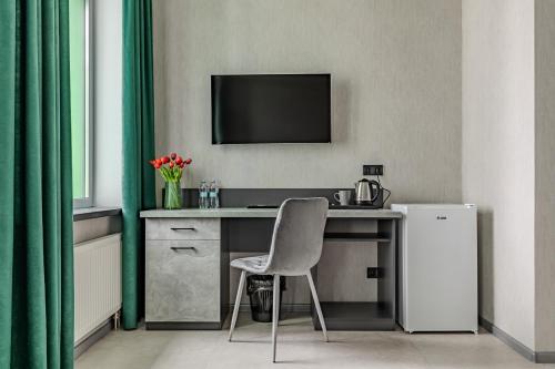 Kuchyň nebo kuchyňský kout v ubytování Green Line Hotel