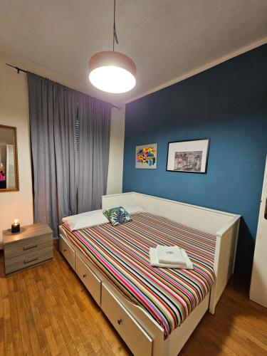Giường trong phòng chung tại Casa al Lingotto