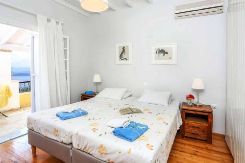 Ένα ή περισσότερα κρεβάτια σε δωμάτιο στο Villa Avgusta