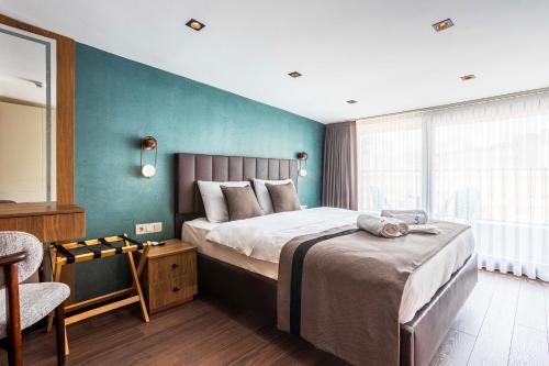 Katil atau katil-katil dalam bilik di Marlon Hotel