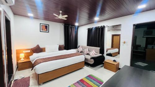Cama o camas de una habitación en Gulmarg Residency