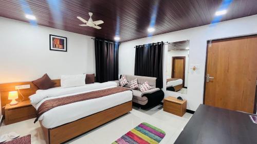 Cama o camas de una habitación en Gulmarg Residency