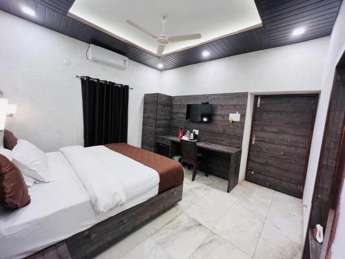Cama o camas de una habitación en Gulmarg Residency