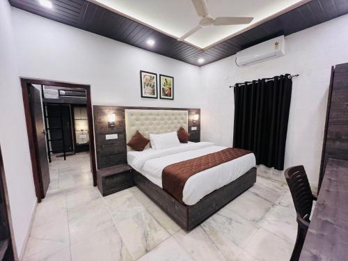 Cama o camas de una habitación en Gulmarg Residency