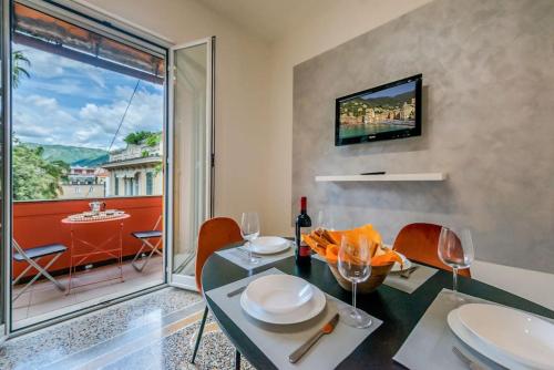 Μια τηλεόραση ή/και κέντρο ψυχαγωγίας στο Casa Roberto - Centrale vista porto Carlo Riva