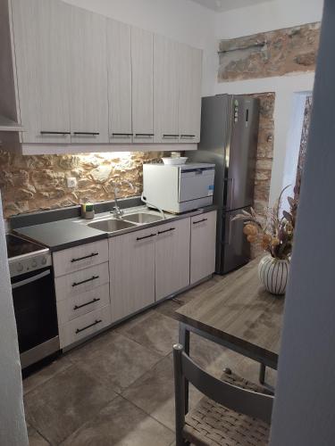 Кухня или мини-кухня в Porto Kagio Villa beach
