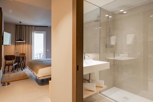Koupelna v ubytování APARTAMENTS LA CARPA