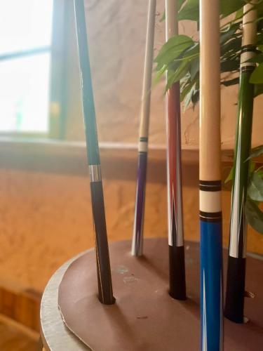 a group of different colored candles in a vase at Skyline Village Inn in Spruce Pine