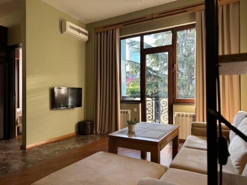 Televisyen dan/atau pusat hiburan di Lavande apartament