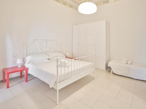 Postel nebo postele na pokoji v ubytování Medusa Apartment - Affresco