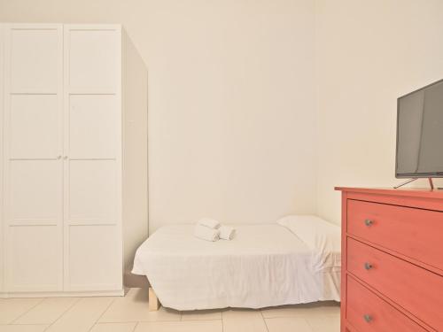 Postel nebo postele na pokoji v ubytování Medusa Apartment - Affresco